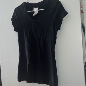 Black tee says it’s L but fits like a S